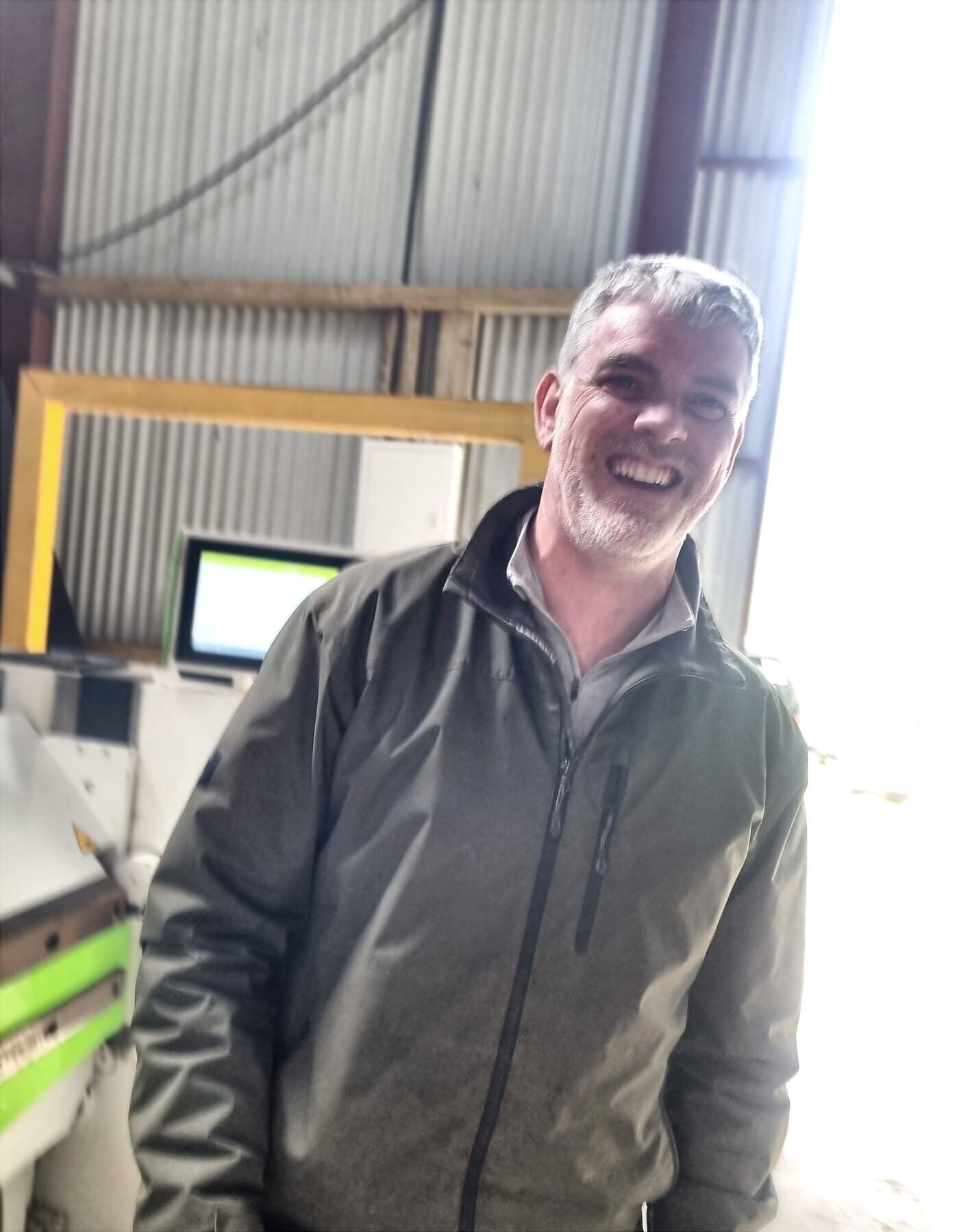 Conor Doherty in the workshop, beside the CNC folding machine
